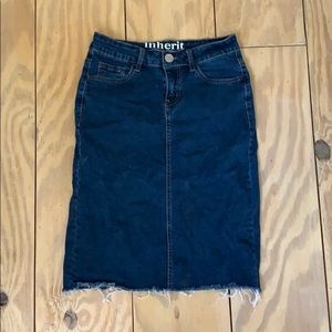 Knee length denim skirt.